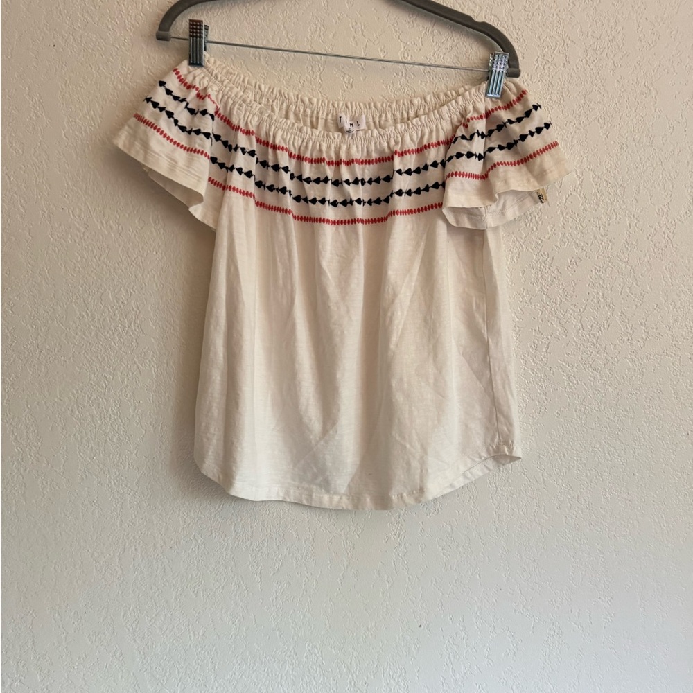 Off-Shoulder White Top with Black and Red Accents